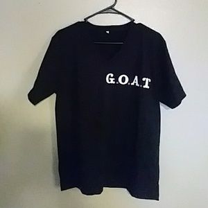 Great condition.  G*O*A*T   T-shirt